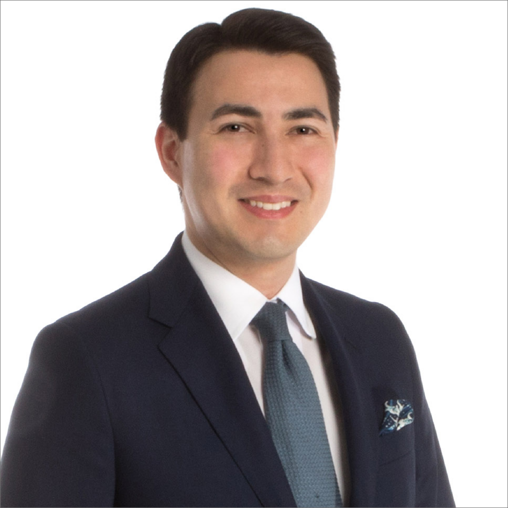 Jeff, an Asian man with black hair, wears a black suit, dark grey tie, and white shirt.